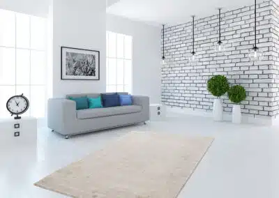 Beiger Premium500 Teppich vor Sofa